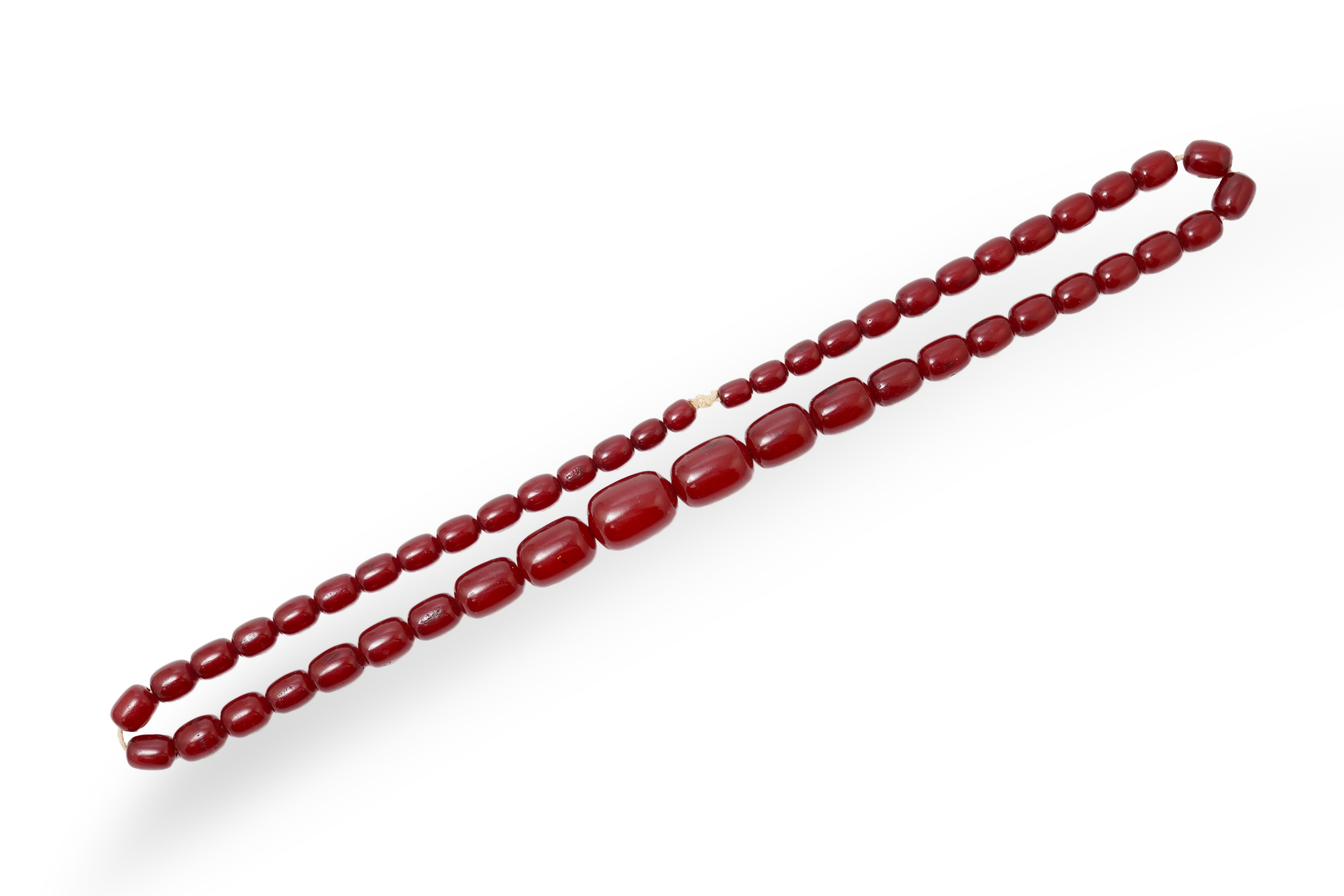 A cherry-coloured bakelite 'amber' necklace